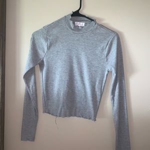 cropped sweater with ruffle neck